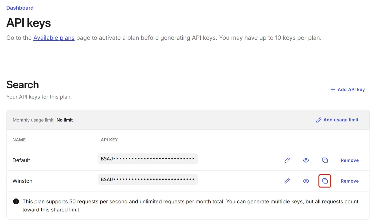 Brave's API keys page for the Search plan listing two keys, Default and Winston, each hidden after its first four characters, with the Winston key's copy button outlined