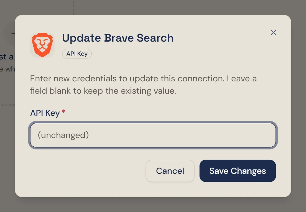 Winston's Update Brave Search dialog, explaining that a blank field keeps the existing value, with an API Key field and a Save Changes button