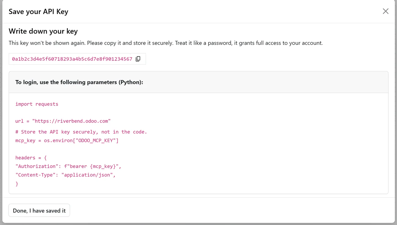 Odoo's Save your API Key dialog showing a new key with a copy button, a warning that it won't be shown again, and a Python code sample